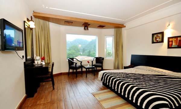 Hotel Suman Paradise Nainital Szoba fotó